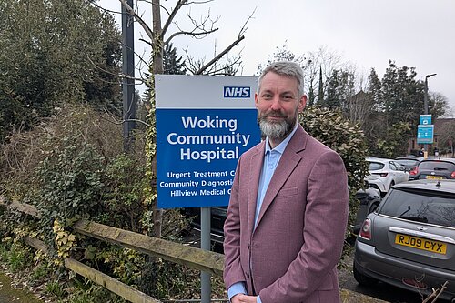 Will Forster outside Woking Community Hospital