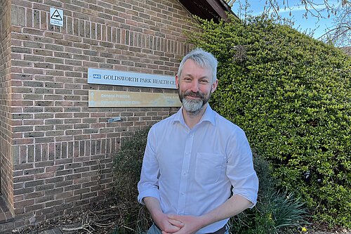 Will Forster outside Goldsworth Park Health Centre
