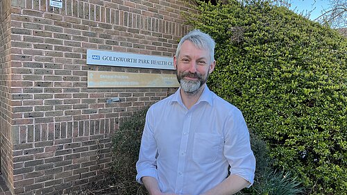 Will Forster outside Goldsworth Park Health Centre